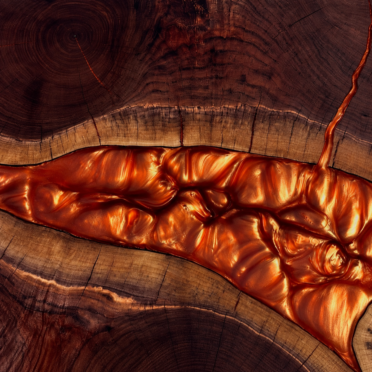 Copper mica resin swirls beside natural walnut grain, temporary image for the mica category