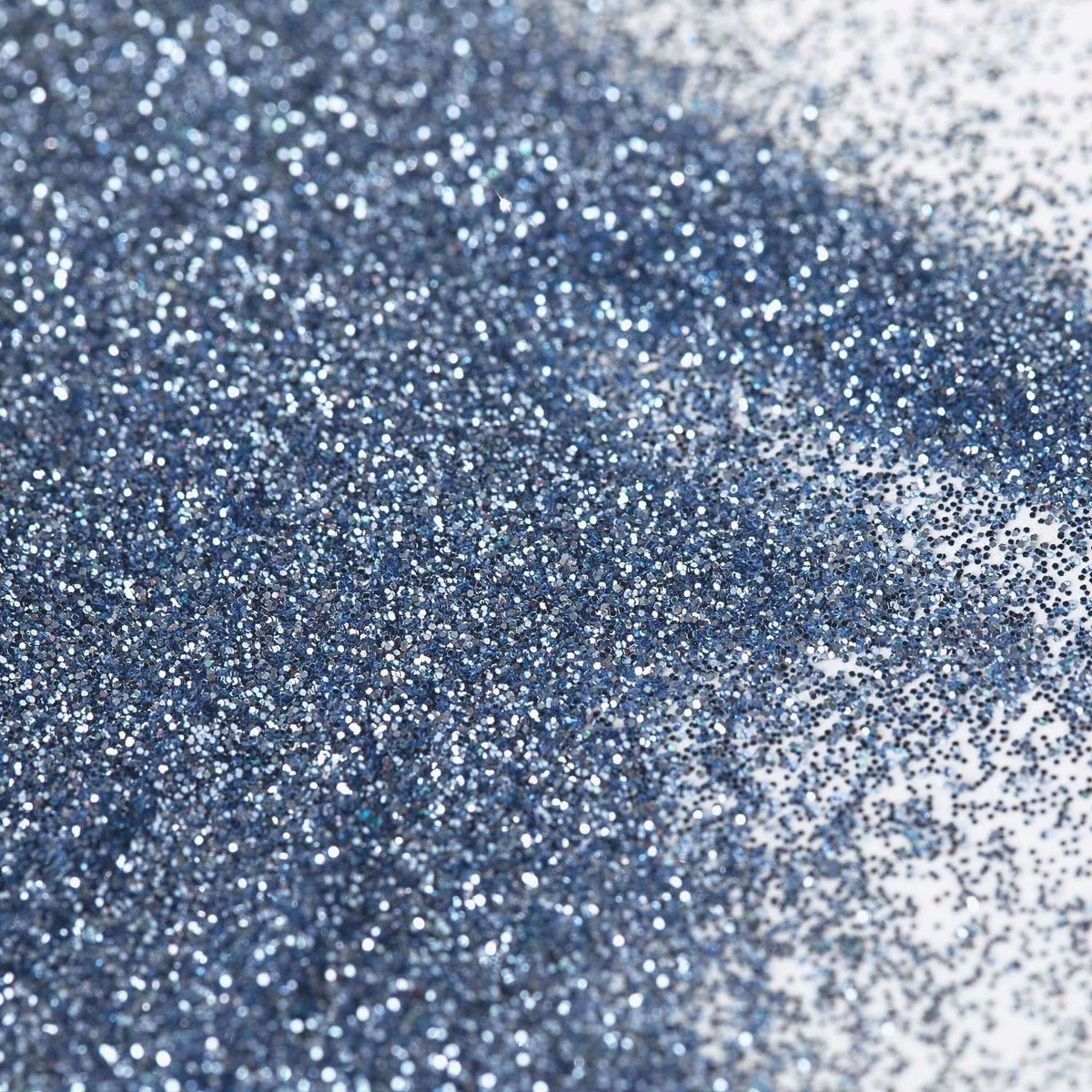 Dry silvery-blue Sapphire Sparkle glitter particles photographed up close